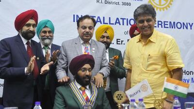 Ravijeet Singh, the newly appointed president of Rotary Club, Mohali Midtown, with Anandpur Sahib MP Manish Tewari and club members on Saturday. (HT Photo)