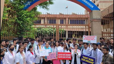 Students protesting outside the National Medical Commission
