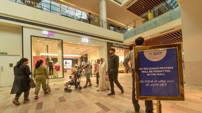 Notices regarding the ban of religious prayers put up inside the atrium of LuLu Mall, a day after controversy broke out after a group of people allegedly offered namaz on the premises, in Lucknow on July 15. (PTI)