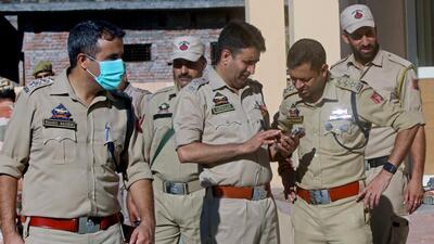 Policemen at Devika Ghat community centre where the shootout took place in Udhampur on Saturday. (ANI Photo)