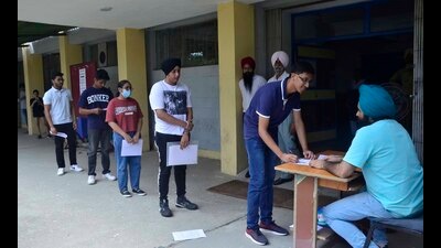 Candidates outside the examination centre for CUET-UG at Guru Nanak Dev Engineering College in Ludhiana on Saturday. (Harvinder Singh/HT) Candidates outside the examination centre for CUET-UG at Guru Nanak Dev Engineering College in Ludhiana on Saturday. (Harvinder Singh/HT)