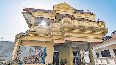 Authorities demolished the residence of activist Mohammad Javed, accused in Prayagraj violence, on June 12. (AP)