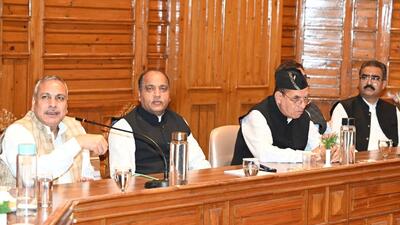 BJP national vice -president Saudan Singh with HP chief minister Jai Ram Thakur and others in Shimla on Saturday. (HT Photo)