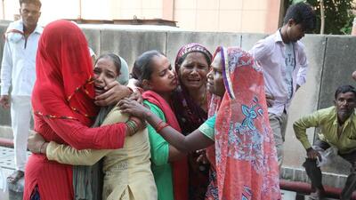 Families of one of the victims wailing at hospital.