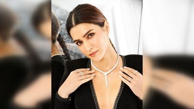 Kriti Sanon paired her chic look with a statement necklace and multiple rings. For her hairdo, she went for the sleek middle-parted look with tied braids. (Instagram/@sukritigrover) Kriti Sanon paired her chic look with a statement necklace and multiple rings. For her hairdo, she went for the sleek middle-parted look with tied braids. (Instagram/@sukritigrover)