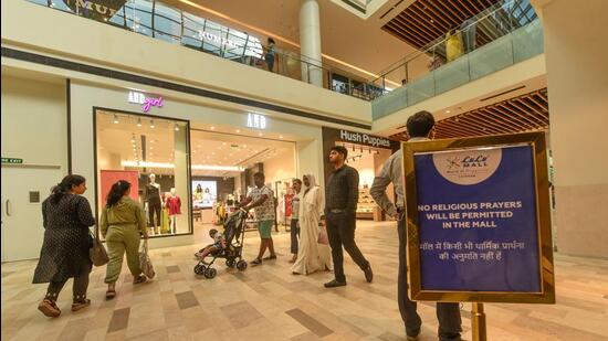 Notices regarding the ban of religious prayers put up inside the atrium of LuLu Mall, a day after controversy broke out after a group of people allegedly offered namaz on the premises, in Lucknow on July 15. (PTI)