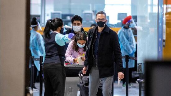 Passengers wait to be tested after they arrive at Toronto’s Pearson airport after Covid-19 testing took effect for international arrivals in Mississauga, Ontario, Canada on February 15, 2021. (REUTERS)