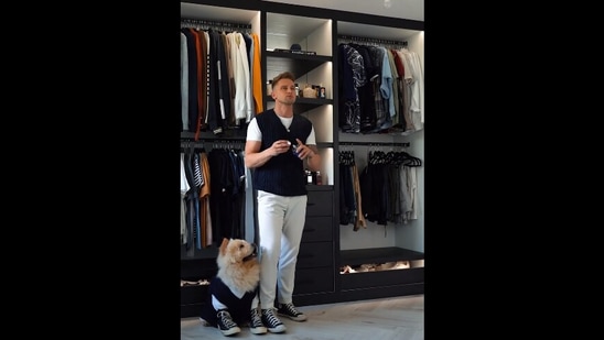 The image, taken from the viral Instagram video, shows the man twinning with his pet dog. (Instagram/@carlcunard)