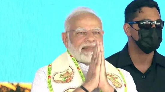 Prime Minister Narendra Modi greets the crowd at Jalaun during the inauguration of Bundelkhand Expressway
