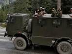 Indian army soldiers are seen atop a vehicle on a highway leading to Ladakh. (REUTERS) Indian army soldiers are seen atop a vehicle on a highway leading to Ladakh. (REUTERS)