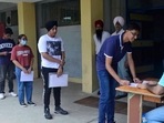 CUET 2022: &nbsp;Candidates outside the examination centre for CUET-UG at Guru Nanak Dev Engineering College in Ludhiana on Saturday. (Harvinder Singh/HT)