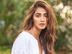 Loved Pooja Hegde's white mini dress she wore to Oxford during her holiday in United Kingdom? It is worth <span class='webrupee'>₹</span>15k Loved Pooja Hegde's white mini dress she wore to Oxford during her holiday in United Kingdom? It is worth <span class='webrupee'>₹</span>15k