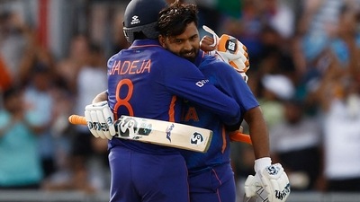 India's Rishabh Pant celebrates reaching his century with Ravindra Jadeja (Reuters)