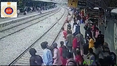 Man save from getting run over by an oncoming train at a Bengaluru railway station. (Twitter/@RailMinIndia)