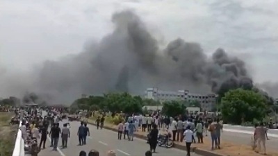 Kallakurichi violence: Smoke rises from the campus area after protesters set school buses on fire. (ANI) Kallakurichi violence: Smoke rises from the campus area after protesters set school buses on fire. (ANI)