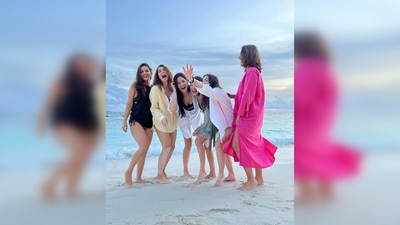 Katrina Kaif kept her look simple and wore a black swimsuit teamed with an oversized white shirt. (Instagram/@katrinakaif) Katrina Kaif kept her look simple and wore a black swimsuit teamed with an oversized white shirt. (Instagram/@katrinakaif)