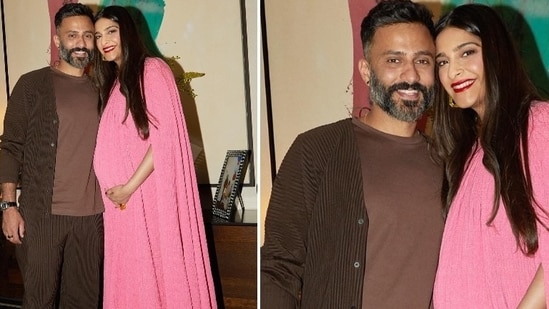 Sonam Kapoor with dad-to-be Anand Ahuja as she holds her growing belly and smiles for the camera.