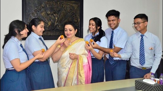 Students of Sat Paul Mittal School, Ludhiana, celebrating after the ICSE Class 10 examination results were announced on Sunday. (Harvinder Singh/HT)