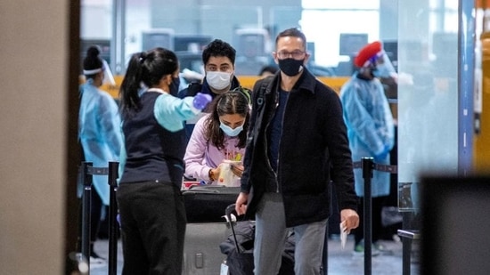 Passengers wait to be tested after they arrive at Toronto’s Pearson airport after Covid-19 testing took effect for international arrivals in Mississauga, Ontario, Canada on February 15, 2021. (REUTERS)