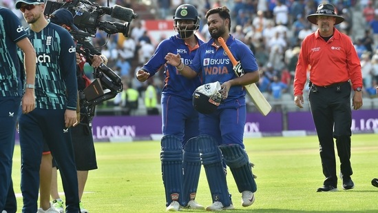 India's Rishabh Pant, right, and India's Ravindra Jadeja leave the pitch at the end of play&nbsp;(AP)