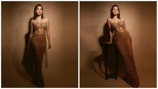Nushrratt Bharuccha once again gave the fashion gods a run for their money as she stepped out looking like the diva she already is in a bronze strapless corset-inspired embellished dress.(Instagram/@nushrrattbharuccha)