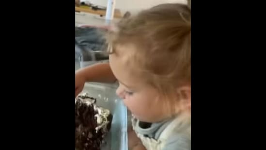 The little girl is eating cake for breakfast in this video,&nbsp;(Instagram/@mikayla__matt)