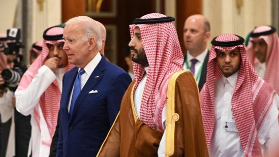 US President Joe Biden (L) and Saudi Crown Prince Mohammed bin Salman (R) arrive for the family photo during the Jeddah Security and Development Summit (GCC+3) at a hotel in Saudi Arabia's Red Sea coastal city of Jeddah on July 16, 2022. (Photo by MANDEL NGAN / POOL / AFP) US President Joe Biden (L) and Saudi Crown Prince Mohammed bin Salman (R) arrive for the family photo during the Jeddah Security and Development Summit (GCC+3) at a hotel in Saudi Arabia's Red Sea coastal city of Jeddah on July 16, 2022. (Photo by MANDEL NGAN / POOL / AFP)