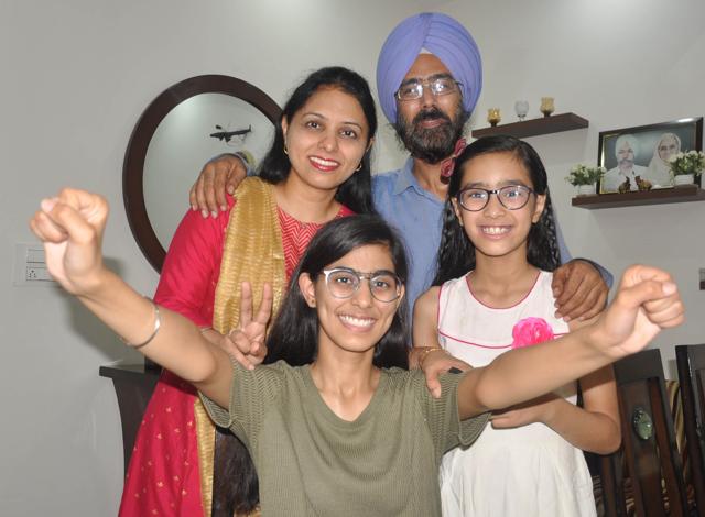 Ravleen Kaur celebrating with her family in Mohali. (Keshav Singh/HT)