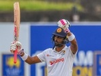 Dinesh Chandimal celebrates after scoring a half-century during Day 3 of the 1st Test between Sri Lanka and Pakistan(AFP) Dinesh Chandimal celebrates after scoring a half-century during Day 3 of the 1st Test between Sri Lanka and Pakistan(AFP)