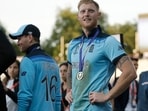 England's Ben Stokes stands on the field after the presentation after winning the Cricket World Cup final