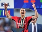 AC Milan's Zlatan Ibrahimovic celebrates ahead of the trophy lift after winning the Serie A.