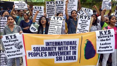 Krantikari Yuva Sangathan (KYS) supporters holding placards stage a protest in solidarity with the people of Sri Lanka amid a massive political and economic crisis in the island nation, at Jantar Mantar in New Delhi on Sunday. (ANI PHOTO.)