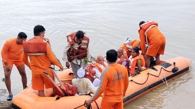 Earlier on Sunday, the National Disaster Response Force (NDRF) personnel carried out relief work in flood-affected areas in Gadchiroli and distributed various essential items among the people. (ANI) Earlier on Sunday, the National Disaster Response Force (NDRF) personnel carried out relief work in flood-affected areas in Gadchiroli and distributed various essential items among the people. (ANI)
