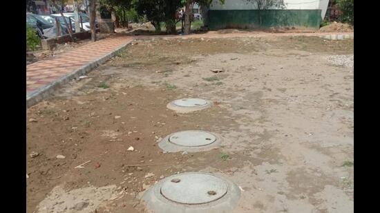 A rainwater harvesting well constructed at Gol market in Ludhiana to prevent waterlogging. (HT PHOTO)