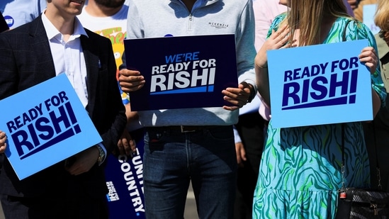 Conservative Party members and activists hold up signs during a visit from Former Chancellor of the Exchequer Rishi Sunak, in Teesport, Redcar, Britain.(REUTERS)