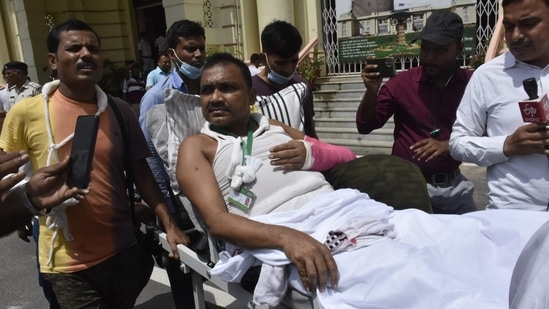 Bihar BJP MLA from Sitamarhi Mithilesh Kumar arrives on a stretcher to cast vote.