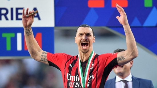 AC Milan's Zlatan Ibrahimovic celebrates ahead of the trophy lift after winning the Serie A.(REUTERS)