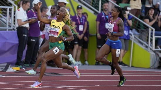 Shelly-Ann Fraser-Pryce of Jamaica reacts after winning gold in the final in the women's 100-meter run at the World Athletics Championships(AP)