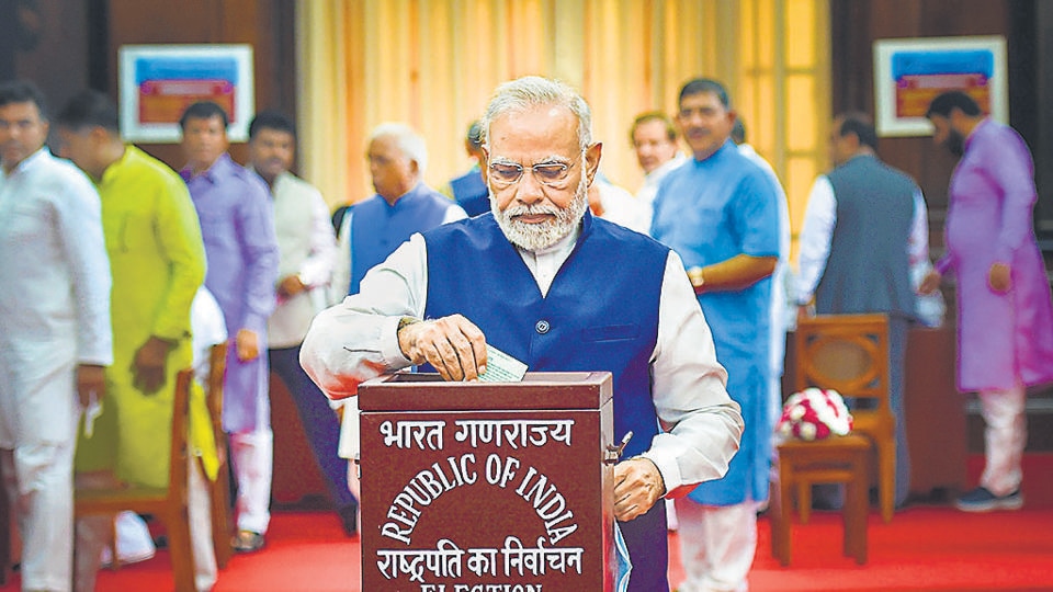 Prime Minister Narendra Modi casts his vote for the election of the President, at Parliament House in New Delhi. (PTI) Prime Minister Narendra Modi casts his vote for the election of the President, at Parliament House in New Delhi. (PTI)