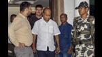 Pankaj Mishra being arrested by ED officials in Ranchi on Tuesday. (PTI)