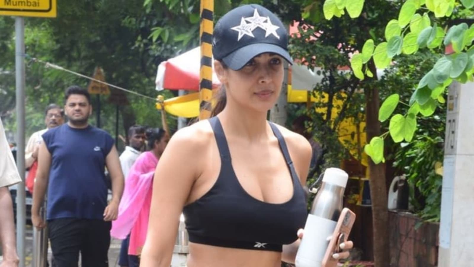Malaika Arora in one-shoulder sports bra and pants teaches the bay