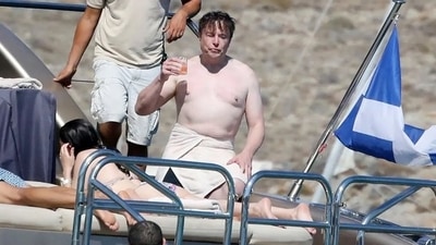 The Tesla and SpaceX CEO was spotted hanging out with his friends and a mysterious woman on a yacht on the island destination. (Twitter/@kingbullyo) The Tesla and SpaceX CEO was spotted hanging out with his friends and a mysterious woman on a yacht on the island destination. (Twitter/@kingbullyo)