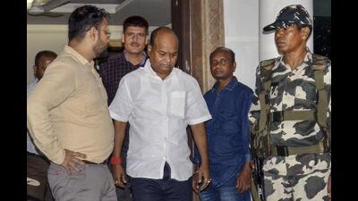 Pankaj Mishra being arrested by ED officials in Ranchi on Tuesday. (PTI) Pankaj Mishra being arrested by ED officials in Ranchi on Tuesday. (PTI)