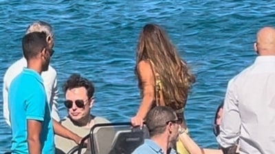 In a few of the viral pictures, the multi-millionaire businessman was seen with a mysterious woman dressed in a yellow bikini top and skirt. (Twitter/@Futureistody) In a few of the viral pictures, the multi-millionaire businessman was seen with a mysterious woman dressed in a yellow bikini top and skirt. (Twitter/@Futureistody)