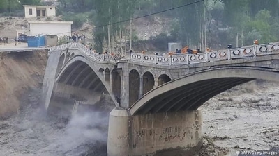 A bridge in Hassanabad village in Pakistan collapsed due to flash floods created after a glacial lake outburst (Deutsche Welle/AFP/Getty Images) A bridge in Hassanabad village in Pakistan collapsed due to flash floods created after a glacial lake outburst (Deutsche Welle/AFP/Getty Images)