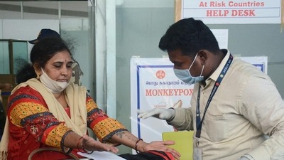 Health workers inspect passengers arriving from high risk countries for monkeypox symptoms, at Chennai International Airport. (ANI) Health workers inspect passengers arriving from high risk countries for monkeypox symptoms, at Chennai International Airport. (ANI)