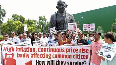 Congress MP Rahul Gandhi joins the Opposition protest on the issues of inflation and price rise in front of Mahatma Gandhi’s statue in Parliament complex during the monsoon session. (ANI) Congress MP Rahul Gandhi joins the Opposition protest on the issues of inflation and price rise in front of Mahatma Gandhi’s statue in Parliament complex during the monsoon session. (ANI)