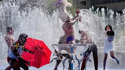 Britain recorded its highest ever temperature of 40C (104F) on Tuesday as a heatwave gripping Europe intensified, scorching fields and damaging airport runways and train tracks. (AP) Britain recorded its highest ever temperature of 40C (104F) on Tuesday as a heatwave gripping Europe intensified, scorching fields and damaging airport runways and train tracks. (AP)