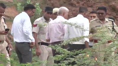 Police officials at the murder spot. (ANI) Police officials at the murder spot. (ANI)