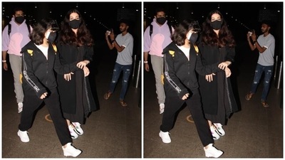 In the end, Aishwarya chose sleek black eyeliner and a no-makeup look for the glam picks. A black face mask to keep herself safe amid the Covid-19 pandemic completed Aishwarya's airport look. Aaradhya and Abhishek also wore face masks to stay safe from the virus. (HT Photo/Varinder Chawla) In the end, Aishwarya chose sleek black eyeliner and a no-makeup look for the glam picks. A black face mask to keep herself safe amid the Covid-19 pandemic completed Aishwarya's airport look. Aaradhya and Abhishek also wore face masks to stay safe from the virus. (HT Photo/Varinder Chawla)